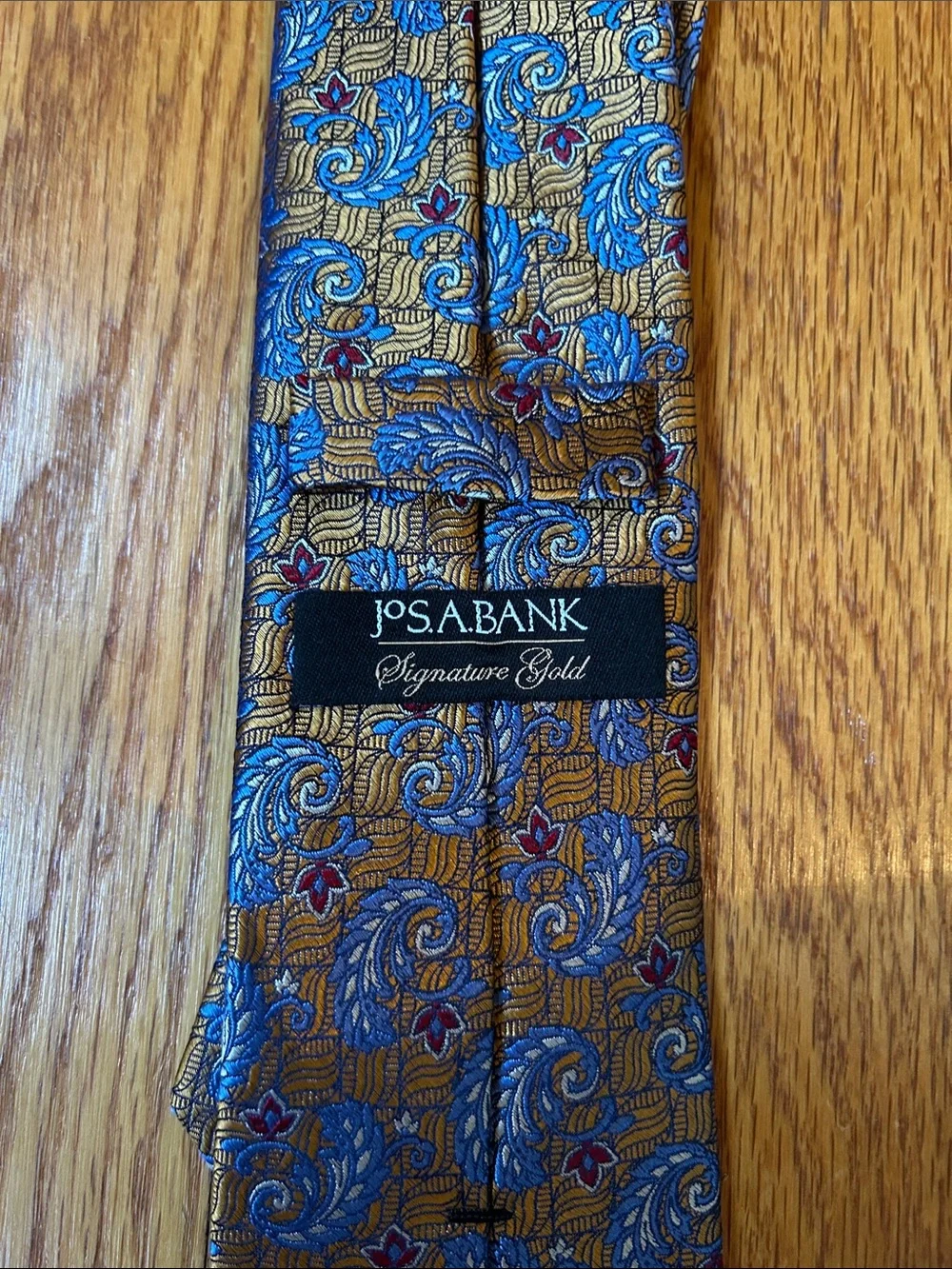 Jos. A. Bank Signature Gold 100% Silk Paisley Tie with Red Accents